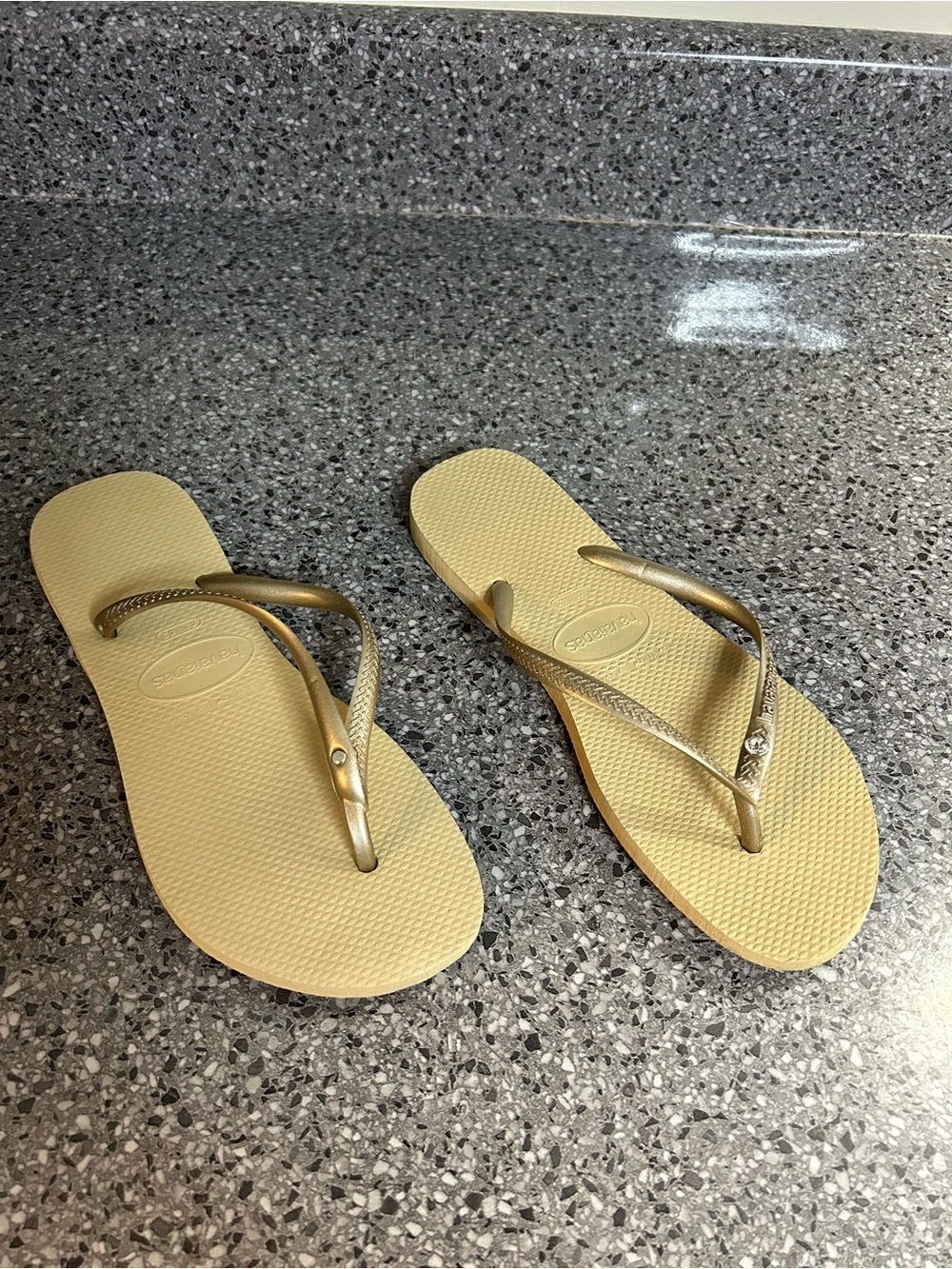 Havaianas Slim Flip Flops in Metallic Gold